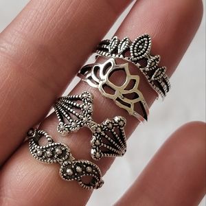 Four Fashion Stacking Rings Silver Tone Paisley and Crown Lotus Flower